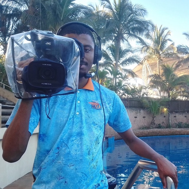 A SAAMBR AV Technician with a video camera